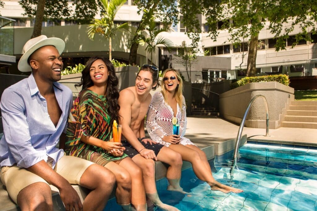 Image of guests sitting at the Maslow pool