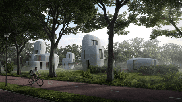 man cycling past 3d printed home