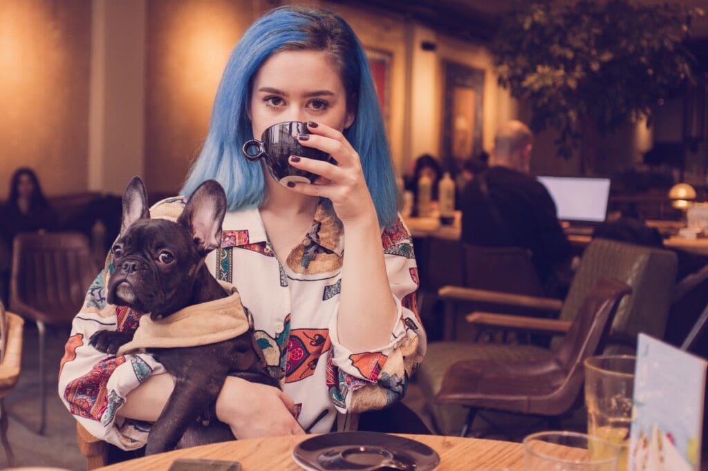 lady with dog in starbucks