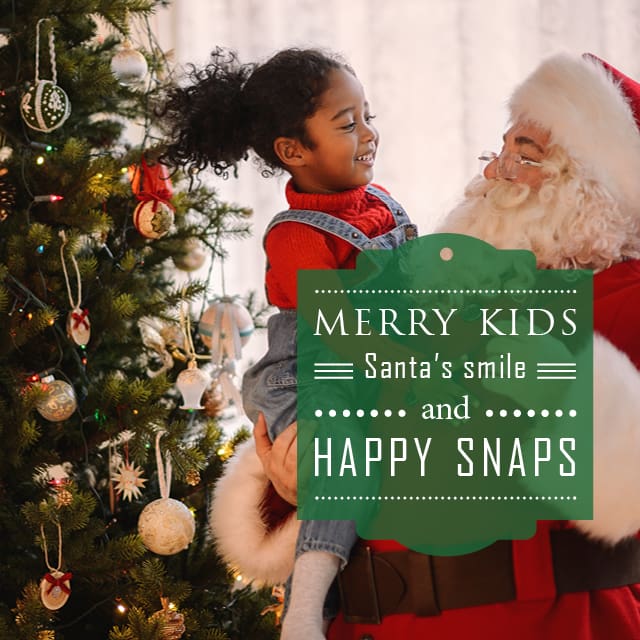 Santa claus and little girl next to Christmas Tree