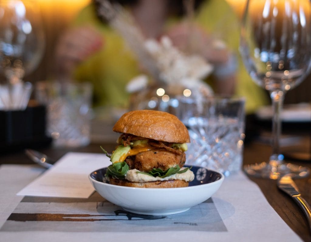 Burger on a table at Kashew Restaurant