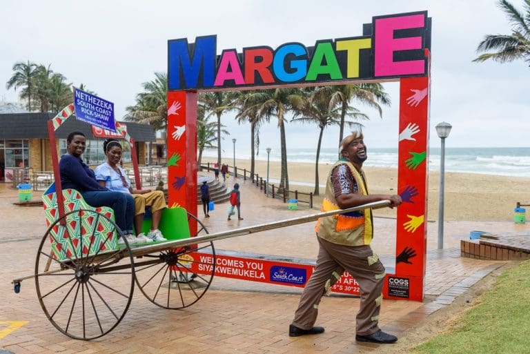 couple in a rickshaw on the kzn south coast