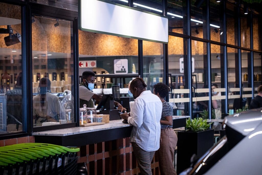 two people ordering coffee at The Pantry in Rosebank