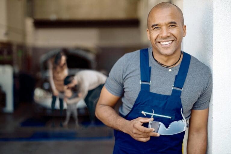 Man standing next to car