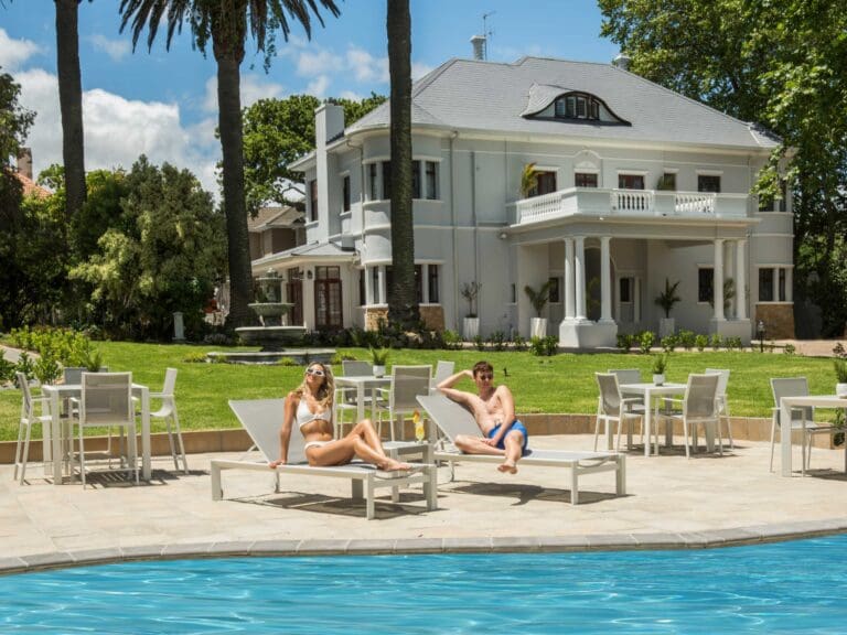 Palm House Exterior By the pool