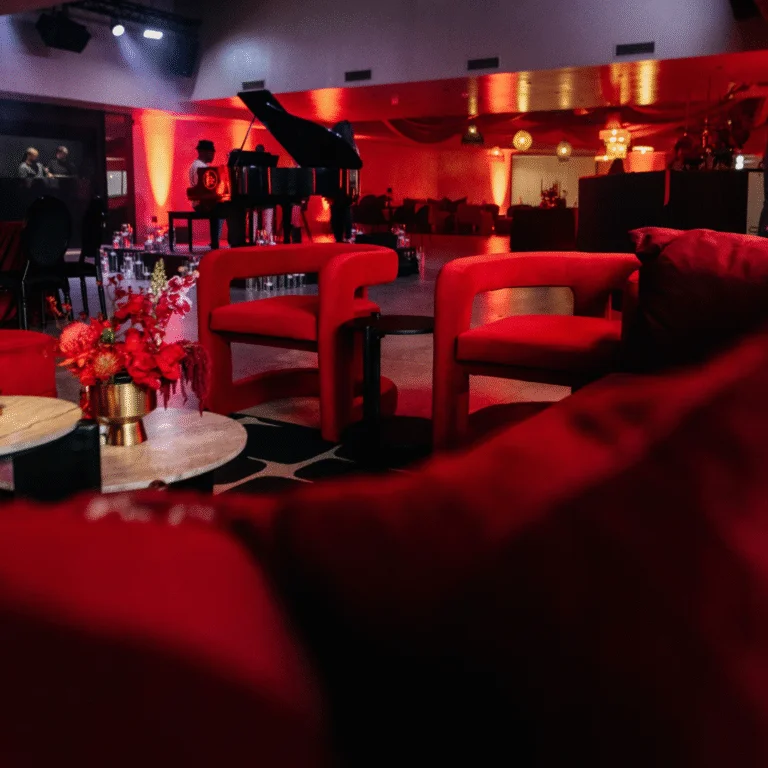 Inside LUXX Venue painted in a red hue