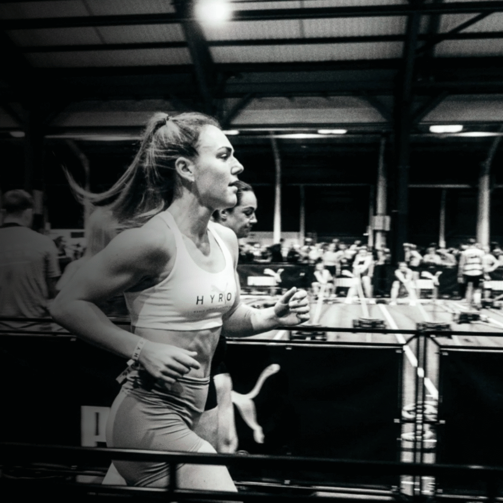 Woman Running at Hyrox SA event