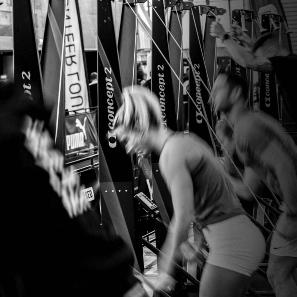 Woman on ski erg machine at HYROX event
