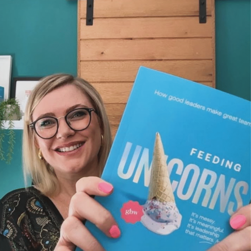 Feeding Unicorns author Jeni-Anne Campbell showing her new self-help book