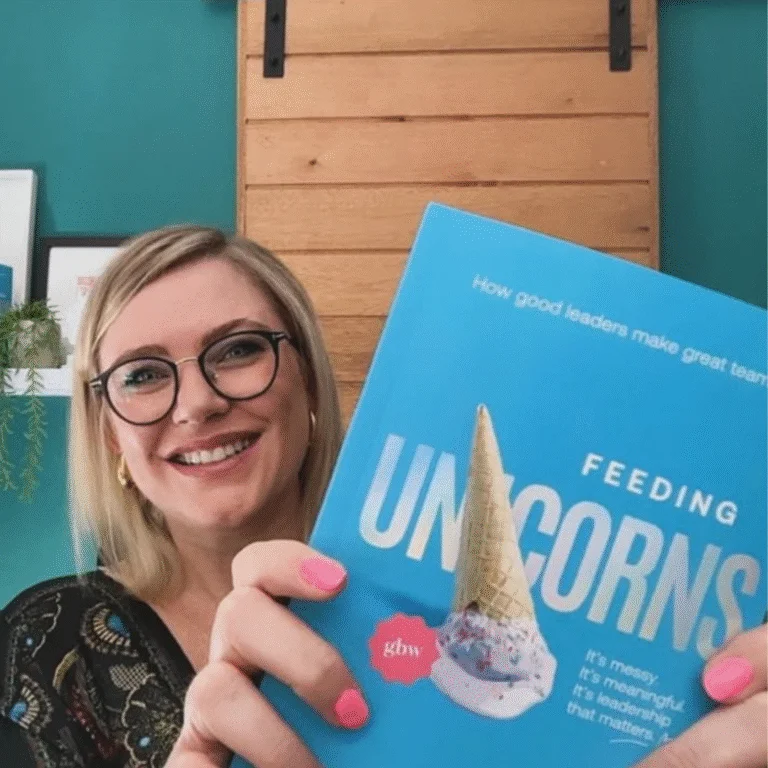 Feeding Unicorns author Jeni-Anne Campbell showing her new self-help book