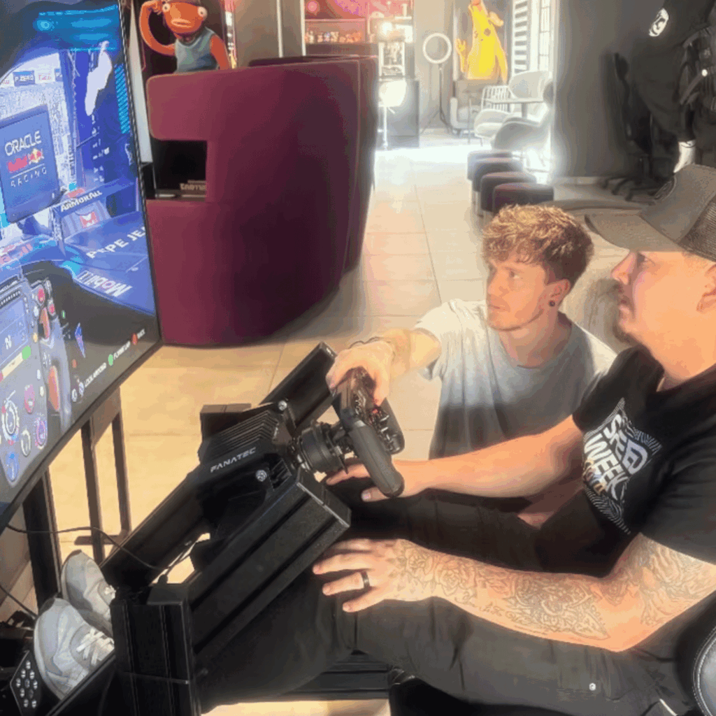 two men playing computer games at The Gulag