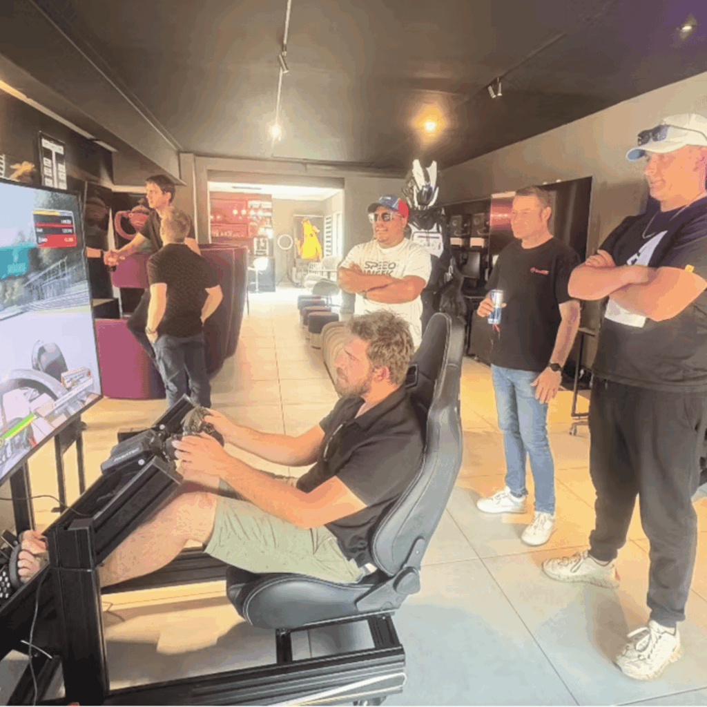 men playing computer games at The Gulag