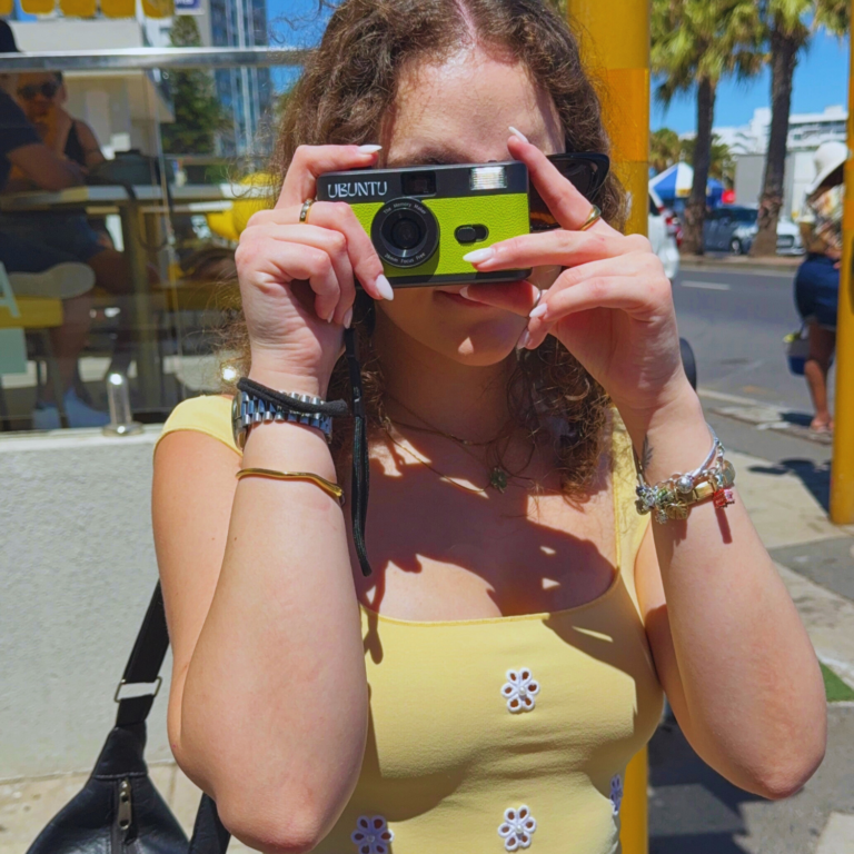 A woman using the Ubuntu Film Co Memory Maker