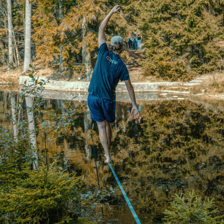man walking on a tightrope