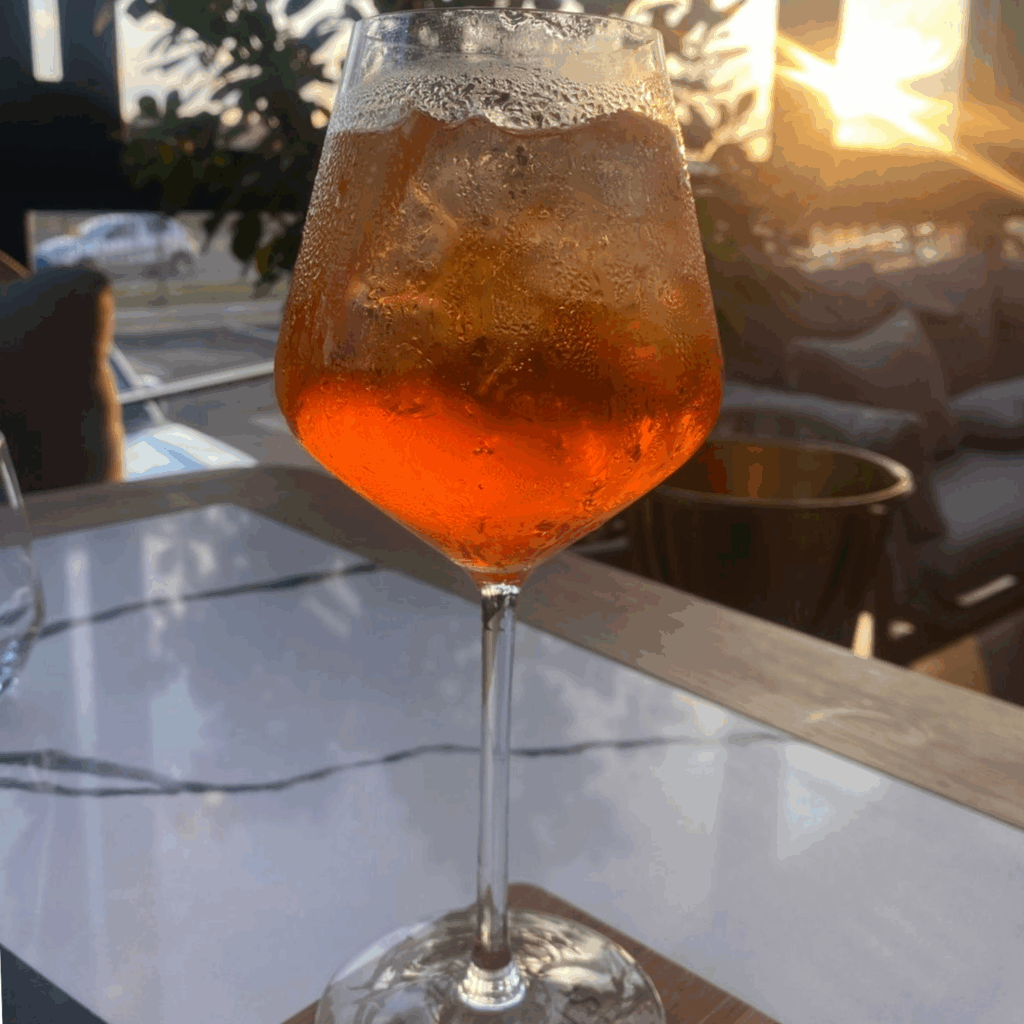 S!GNS Aperol spritz and sunset