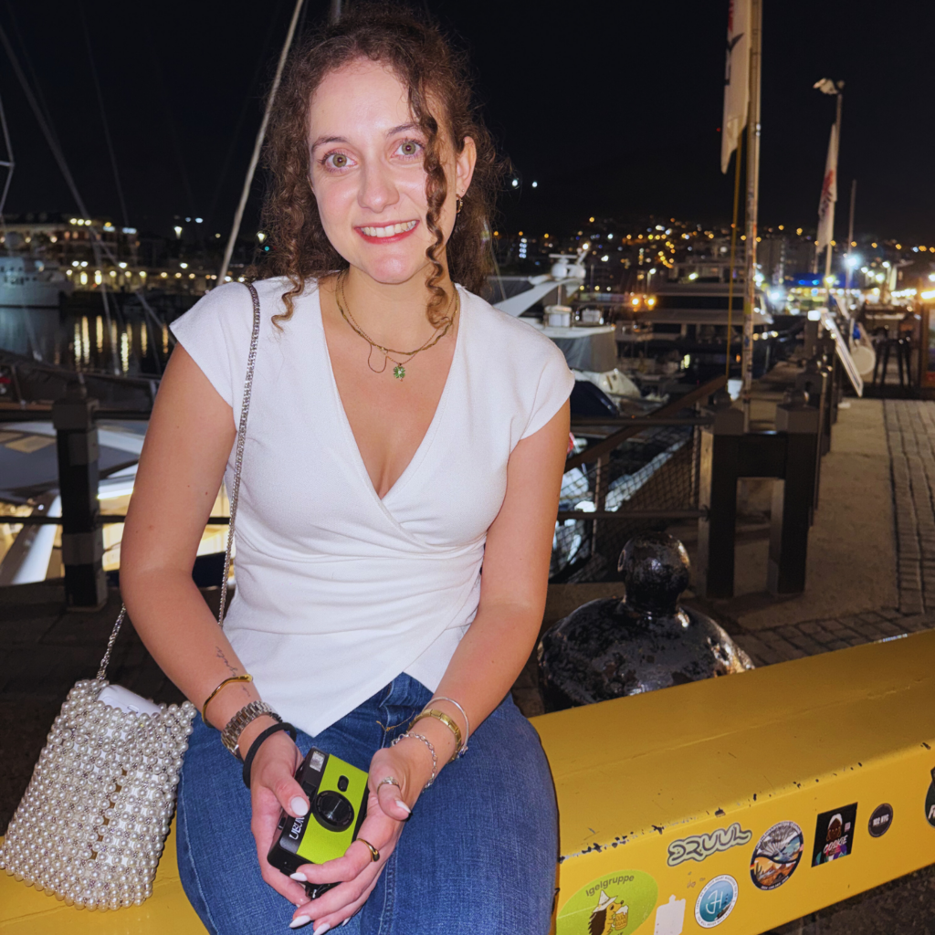 A woman using the Ubuntu Film Co Memory Maker at V&A Waterfront