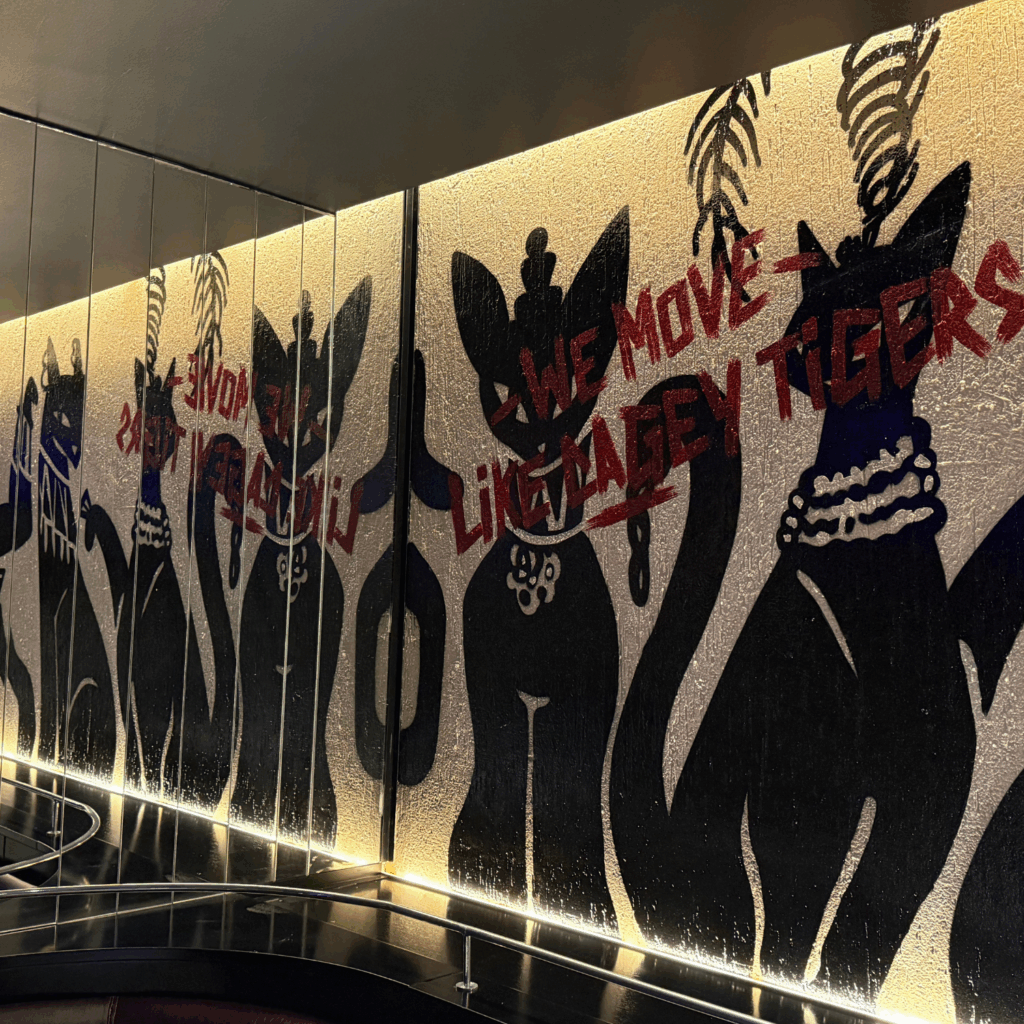 Nine Lives Mural on Wall