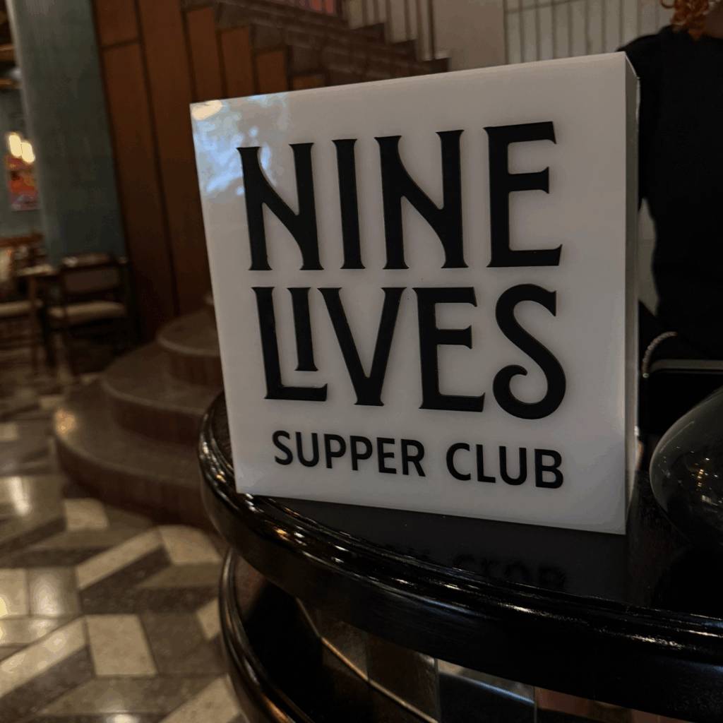 Nine Lives Supper Club Sign