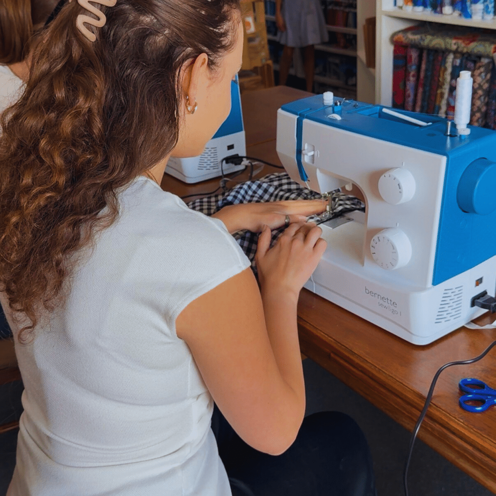 girl sewing