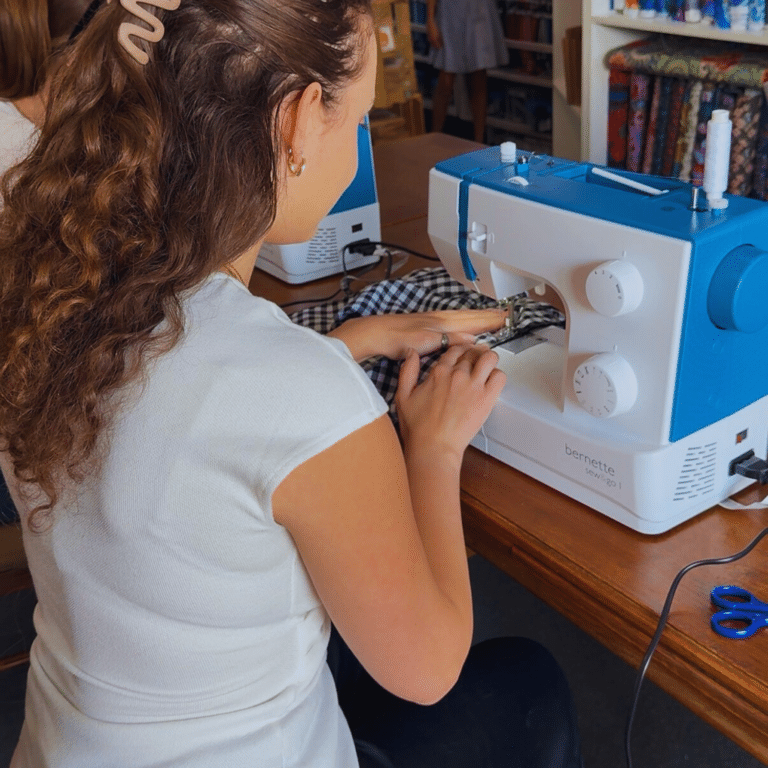 girl sewing