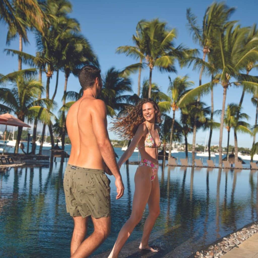 Mauricia Beachomber Couple by The Pool