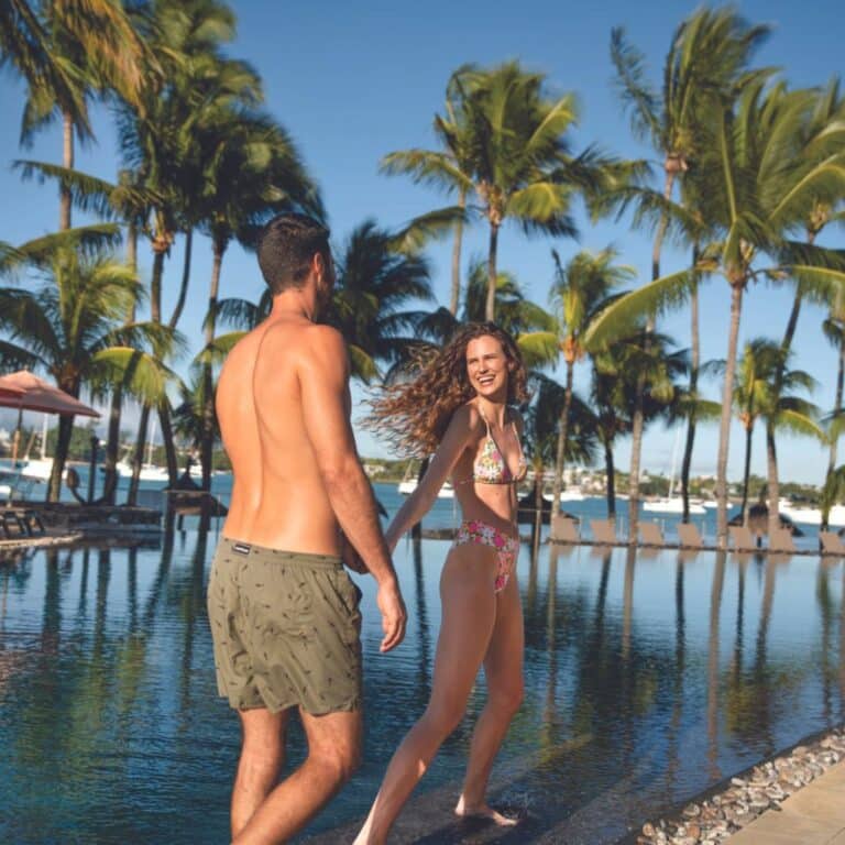 Mauricia Beachomber Couple by The Pool