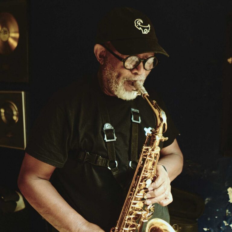 Sipho “Hotstix” Mabuse Sax in Old Khaki Clothing