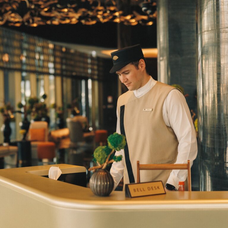 Roux Willem Hattingh welcoming guests at a hotel reception area